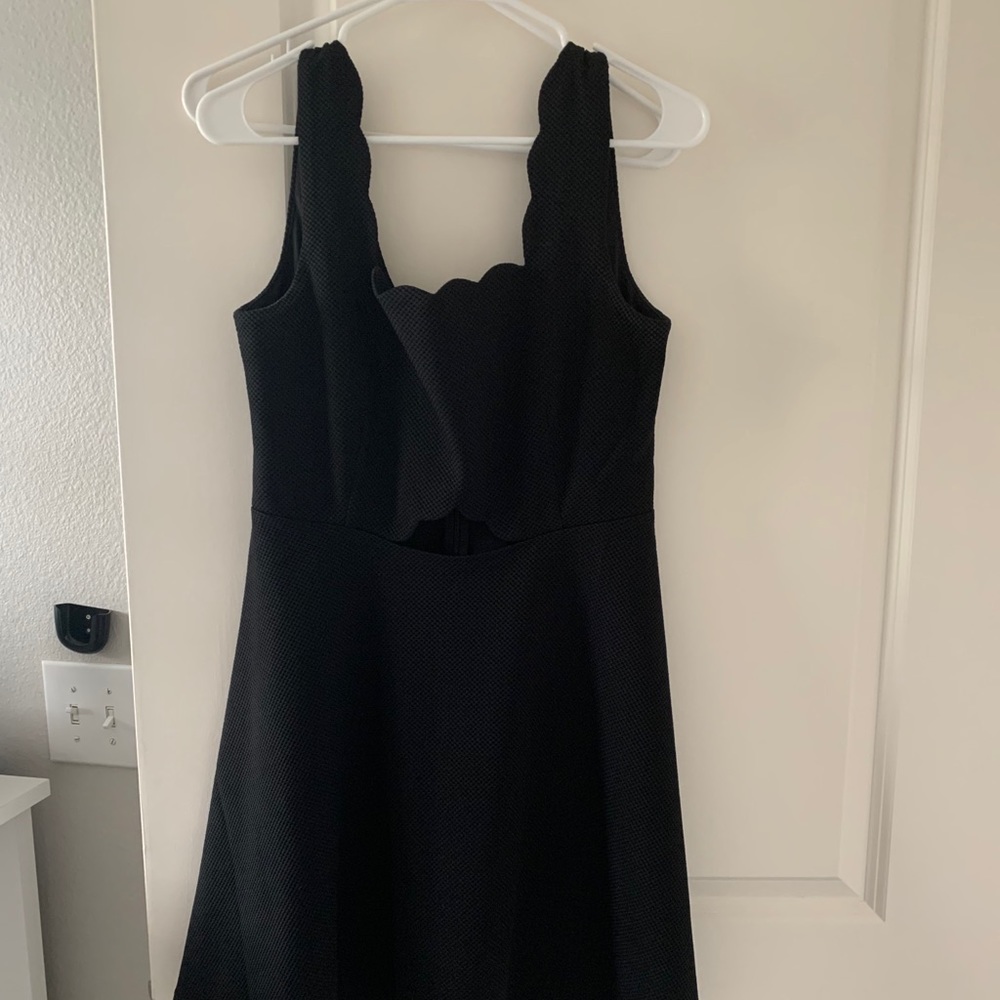 Black dress with scallop tank cut and cutout